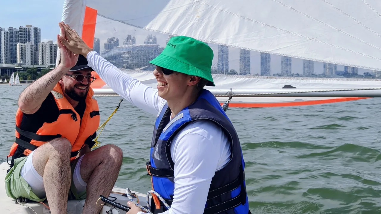 SeaQuest instructor coaching a student in a dinghy