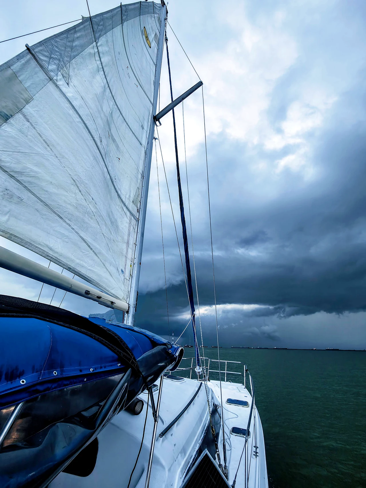 SeaQuest I sails beneath dark clouds